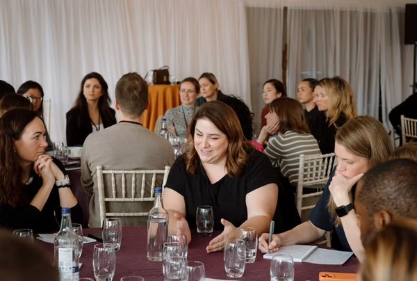 Laura facilitating a roundtable